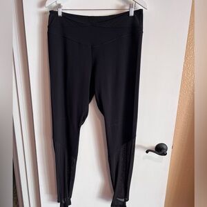Lululemon leggings, black. Stirrup. Sheer in legs. Good condition. Size 14.